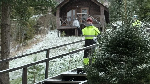 Child in ski clothes. A child throws snow in the forest, Carpathian Ukraine Stock Footage 102889841