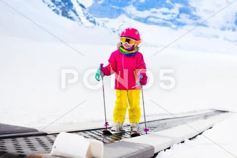Child on ski lift Stock Photos