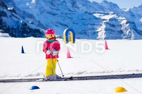 Child in ski school Stock Photos
