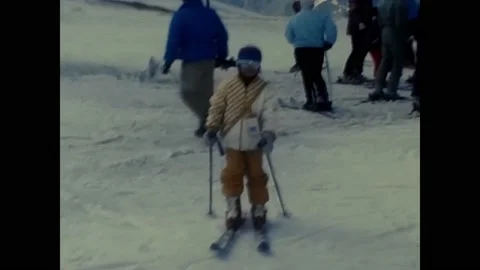 Child skiing in the snow in the 80s Stock Footage 222065010