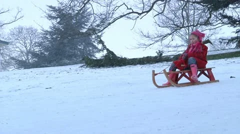 Child sledding Stock Footage 22666307