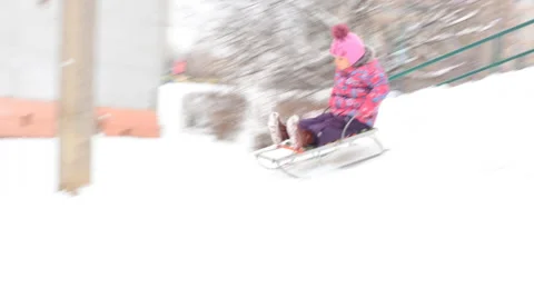 Child Sledding  on Hill, Kid Playing, Sledging in Park in Winter Stock Footage 47164135