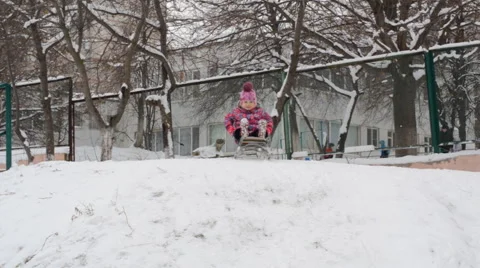 Child Sledding  on Hill, Kid Playing, Sledging in Park in Winter Stock Footage 47164167
