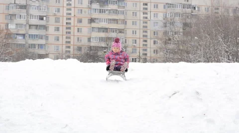 Child Sledding  on Hill, Kid Playing, Sledging in Park in Winter Stock Footage 47164171