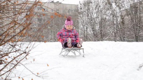 Child Sledding  on Hill, Kid Playing, Sledging in Park in Winter Stock Footage 47164188