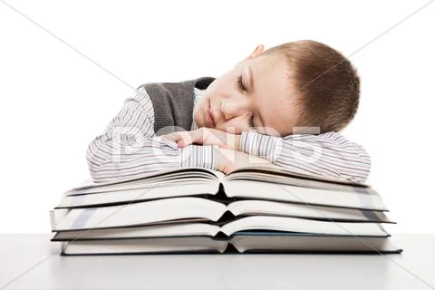 Child sleeping on reading books Stock Photos