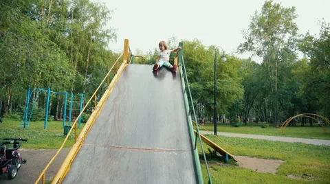 Child on slide. Stock Footage 65084514