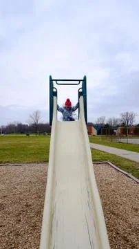 Child on Slide Stock Photos