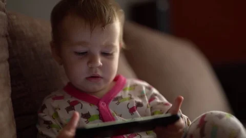 Child with a smartphone Stock Footage 73331662