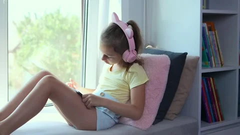 The child with a smartphone. The problem of addiction to gadgets Stock Footage 325717548