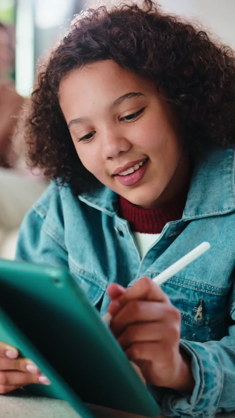 Child, smile and elearning with tablet in home, growth and skill development Stock Footage 335749420