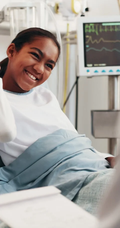 Child, smile and high five in hospital bed with doctor, good news and optimistic Video stock 346288323