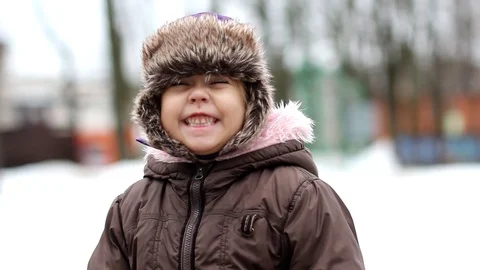 Child smiling and looking at camera Stock Footage 123533653