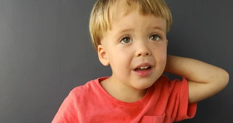 Child smiling asking for hold, wanting attention at home Video stock 101778654