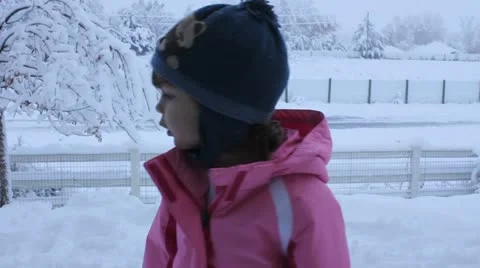 Child in snow Stock Footage 11633759