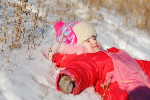 Child on the snow Stock Photos