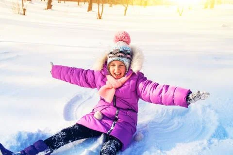 The child in snow Stock Photos