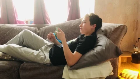 Child on Sofa Stock Footage 163585088