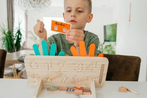 Child solving math problems Stock-Fotos