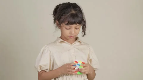 Child Solving a Rubik's Cube Stock-Footage 281359498