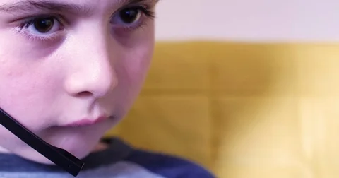 Child speaking into computer headset Stock Footage 79660238