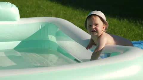 Child splashes water Stock Footage 285850928