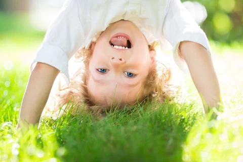 Child in spring park Stock Photos