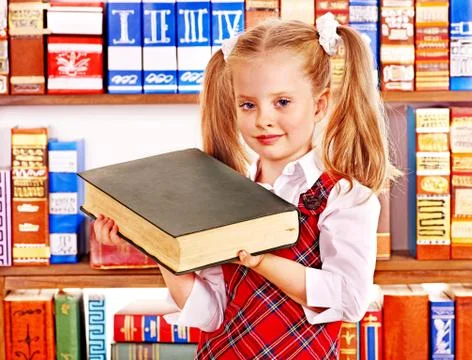 Child with stack book. 스톡 사진