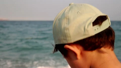 Child standing on the seashore Stock Footage 201113440
