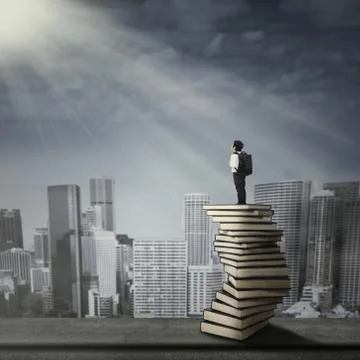Child standing on a stack of books Ilustración de archivo
