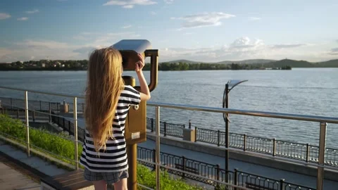 child stands on observation deck and stu... | Stock Video | Pond5