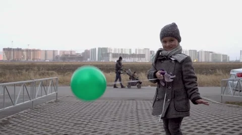 Child staying with balloon Stock Footage 67749243
