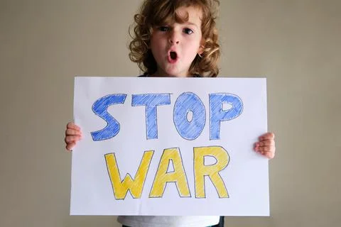 Child with Stop War poster Stock Photos