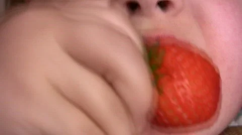 Child with strawberry Stock Footage 263011