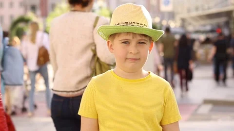 Child on the streets of the city.  Stock Footage 77845559