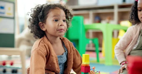 Child, student and stack blocks in classroom for learning, problem solving and Stock Footage 306516023