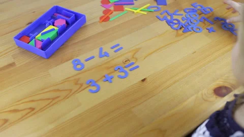 Child studies arithmetic, solves examples Stock Footage 101016664