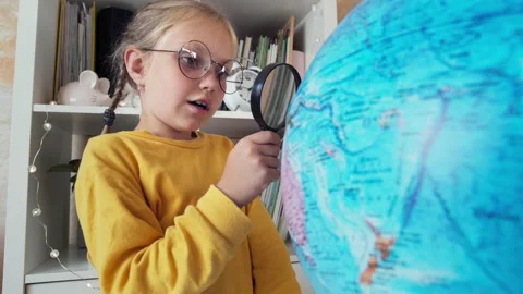 Child studies geography at home Stock Footage 161003261