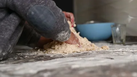 The child is studying cooking. baking and baby. The kid loves to cook Stock Footage 132731910
