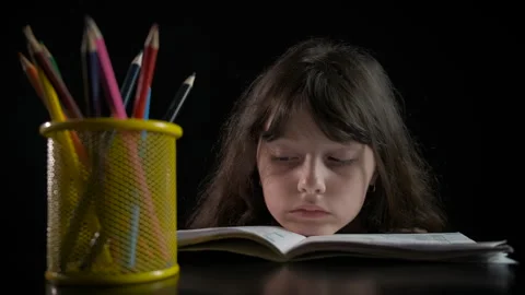 The child is studying. Stock Footage 250556004