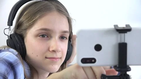 Child Studying, Playing on Smartphone in Video Conferencing, Kid Learning Tablet Stock Footage 340182946