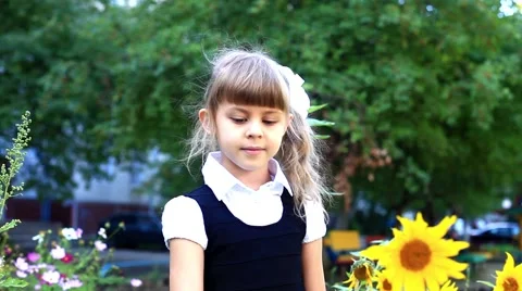 Child with sunflower Stock Footage 42703051