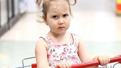 The child in the supermarket Stock Footage 78338061