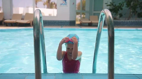Child swimmer in the pool Stock Footage 76145803