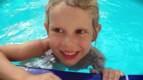 Child swimmer in the pool Video stock 78778153
