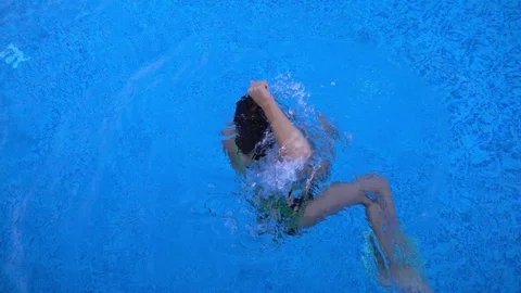 Child is in Swimming Pool Stock Footage 93758282