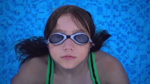 Child is in Swimming Pool Stock Footage 93758723