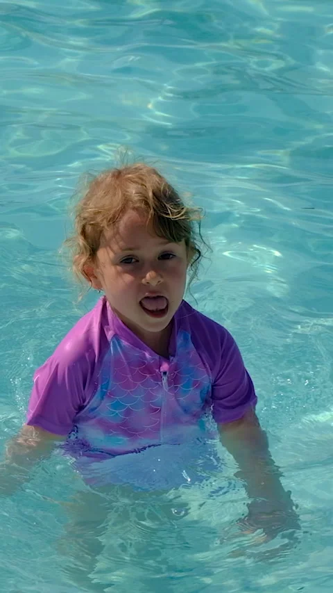 Child swimming in the pool. Selective focus. Stock Footage 335149425