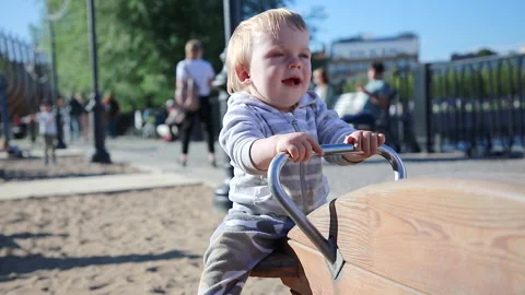 Child on a swing Stock Footage 137541269