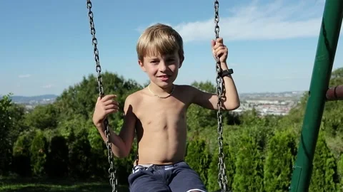 Child on a swing Stock-Footage 139402964